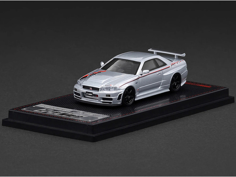 Nissan Skyline GT R BNR34 Z Tune Nismo RHD Right Hand Drive Silver Metallic with Graphics 1/64 Diecast Model Car Ignition Model IG3840