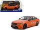 2024 BMW M5 Sedan Fire Orange III with Black Top 1/43 Diecast Model Car Solido S4317552