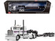 Peterbilt 389 with 36 Flat Top Sleeper and Fontaine Magnitude Lowboy Trailer White with Black Stripes 1/64 Diecast Model DCP/First Gear 60-2191