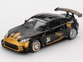 Toyota GR86 LB Nation Liberty Walk #24 Black with Carbon Hood and Gold Graphics Limited Edition 1/64 Diecast Model Car Mini GT MGT01149