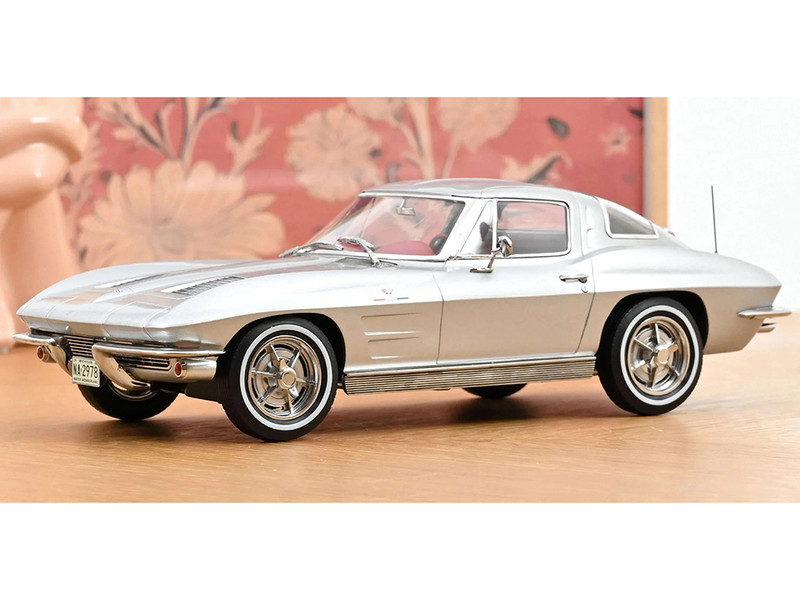 1963 Chevrolet Corvette Sting Ray Sebring Silver Metallic with Red Interior 1/18 Diecast Model Car Norev 189052