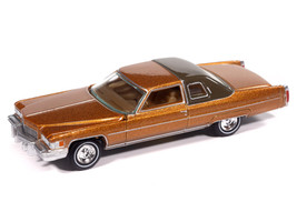 1976 Cadillac Coupe DeVille Amberlite Firemist Metallic Luxury Cruisers Series 1/64 Diecast Model Car Auto World 64532-AWSP210A