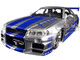 Brian s Nissan GTR Skyline R34 RHD Right Hand Drive Silver with Blue Stripes Fast & Furious 25th Anniversary Series 1/24 Diecast Model Car Jada 97158-25TH Brian s Nissan GTR Skyline R34 RHD Right Hand Drive Silver with Blue Stripes Fast & Furious 25th Anniversary Series 1/24 Diecast Model Car Jada 97158-25TH