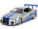 Brian s Nissan Skyline GT R R34 Silver Metallic with Blue Stripes and Suki s Honda S2000 Pink with Graphics Set of 2 Cars Fast & Furious 25th Anniversary Fast & Furious Series 1/24 Diecast Model Cars Jada 37543