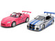 Brian s Nissan Skyline GT R R34 Silver Metallic with Blue Stripes and Suki s Honda S2000 Pink with Graphics Set of 2 Cars Fast & Furious 25th Anniversary Fast & Furious Series 1/24 Diecast Model Cars Jada 37543