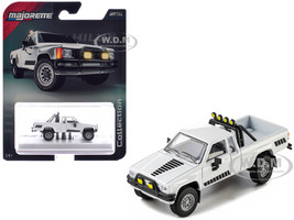 1985 Toyota Hilux SR5 Pickup Truck White with Black Graphics Collection Series 1/64 Diecast Model Car by Majorette MJ8505001022