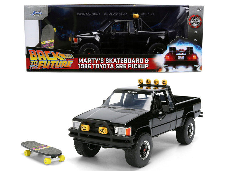 1985 Toyota SR5 Pickup Truck Black with Marty s Skateboard Back to the Future 1985 Movie Hollywood Rides Series 1/24 Diecast Model Car Jada 36479