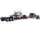 Kenworth W900L with 72 Aerocab Flat Top Sleeper Blue with White Stripes and Fontaine Magnitude Lowboy Trailer with Kenworth W900A Load White with Blue and Red Stripes America 250 1/64 Diecast Model DCP/First Gear 69-2311