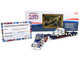 Kenworth W900L with 72 Aerocab Flat Top Sleeper Blue with White Stripes and Fontaine Magnitude Lowboy Trailer with Kenworth W900A Load White with Blue and Red Stripes America 250 1/64 Diecast Model DCP/First Gear 69-2311