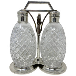 Rare Antique American "Tiffany & Co." Sterling Silver and Hawkes Cut Crystal Double Decanter Tantalus Set, Circa 1920.