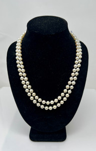 American 14 Karat Gold and Double-Strand 6.5 mm Pearl Necklace.