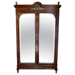 Antique French Gold Bronze Mounted Plum Pudding Mahogany 2-Door Armoire, Circa 1890-1910. Doors are Mirrored with Lovely Curve-Line Beveling.