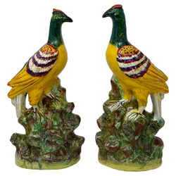 Pair of Antique English Staffordshire Pottery Rock Birds, Circa 1850. Beautifully Hand-Painted in Multiple Colors of Yellow, Green, Red & White.