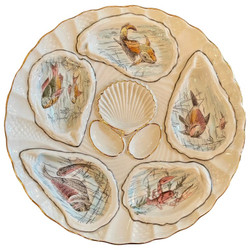 Antique German Hand-Painted Gold Porcelain Oyster Plate with Sea Life, Circa 1890. Various Sea Grasses and Sea Creatures on a White Background with Gold Work Details.