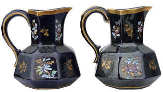 Antique pair of blue gilded and decorated ceramic jugs