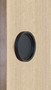 Round Handle Back-to-Back - 2.5" Diameter - For Wood and Glass Doors (Black Powder Stainless Steel Finish) mockup on wood door