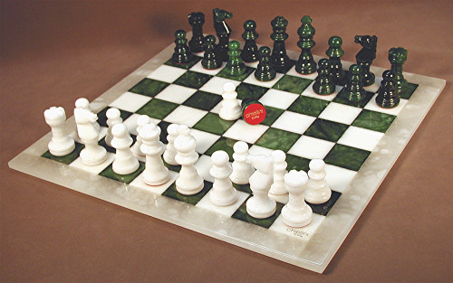 Chess Set: Alabaster Chess Pieces on a Green and White Chess Board