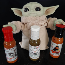 An awesome trio of some of our best sellers. One bottle of "Yo' 'Da Baby" Verde Sauce, One bottle of our 2nd hottest Wing Sauce, the Cluckwing Orange, and a bottle of our hottest Wing Sauce, the Curbstomp.