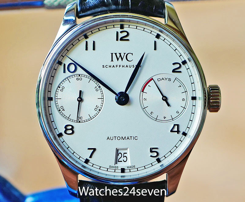 IWC Portuguese 7 Day Automatic Steel White Dial Blue Hands ON HOLD