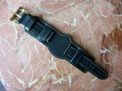 14k Gold Panerai Logo Buckle on black Spartacus strap $600 ON HOLD