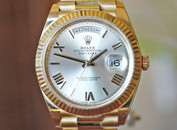 Rolex Day-Date President Silver Roman Dial 18k Yellow Gold 40mm Ref. 228238