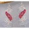 Ruby Dangle Earrings Swirled