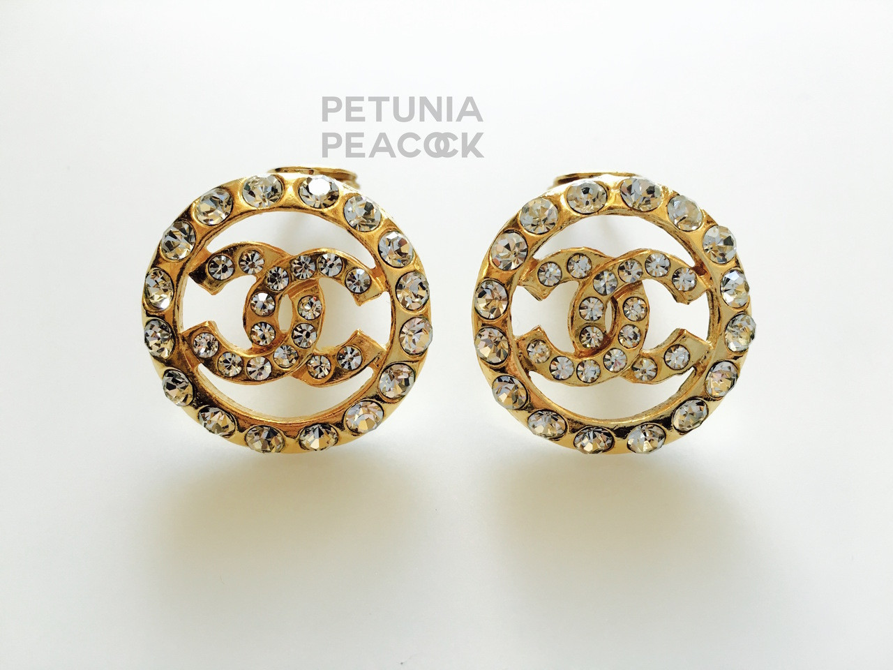 CHANEL CRYSTAL FILLED ROUND CC LOGO EARRINGS - Petunia Peacock