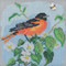 Stitched area of Baltimore Oriole Cross Stitch Kit Mill Hill 2020 Buttons & Beads Spring MH142012