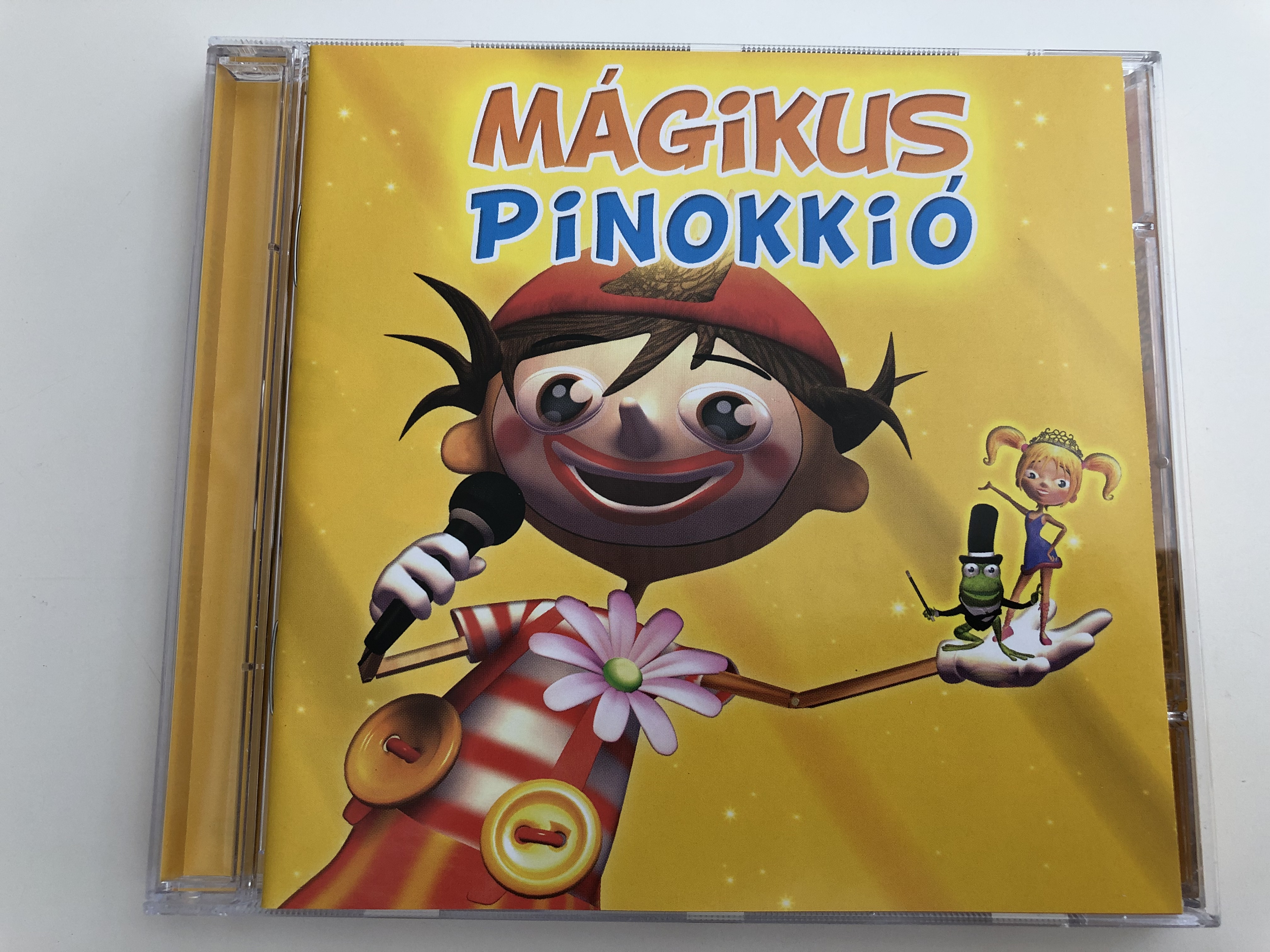 -m-gikus-pinokki-koczogh-kitti-becz-bernadett-hungarian-text-by-csajtay-csaba-videoklip-karaoke-h-tt-rk-p-kifest-s-jelmezb-l-pinokki-val-hungarian-children-s-songs-lavista-audio-cd-2007-emi-1-.jpg