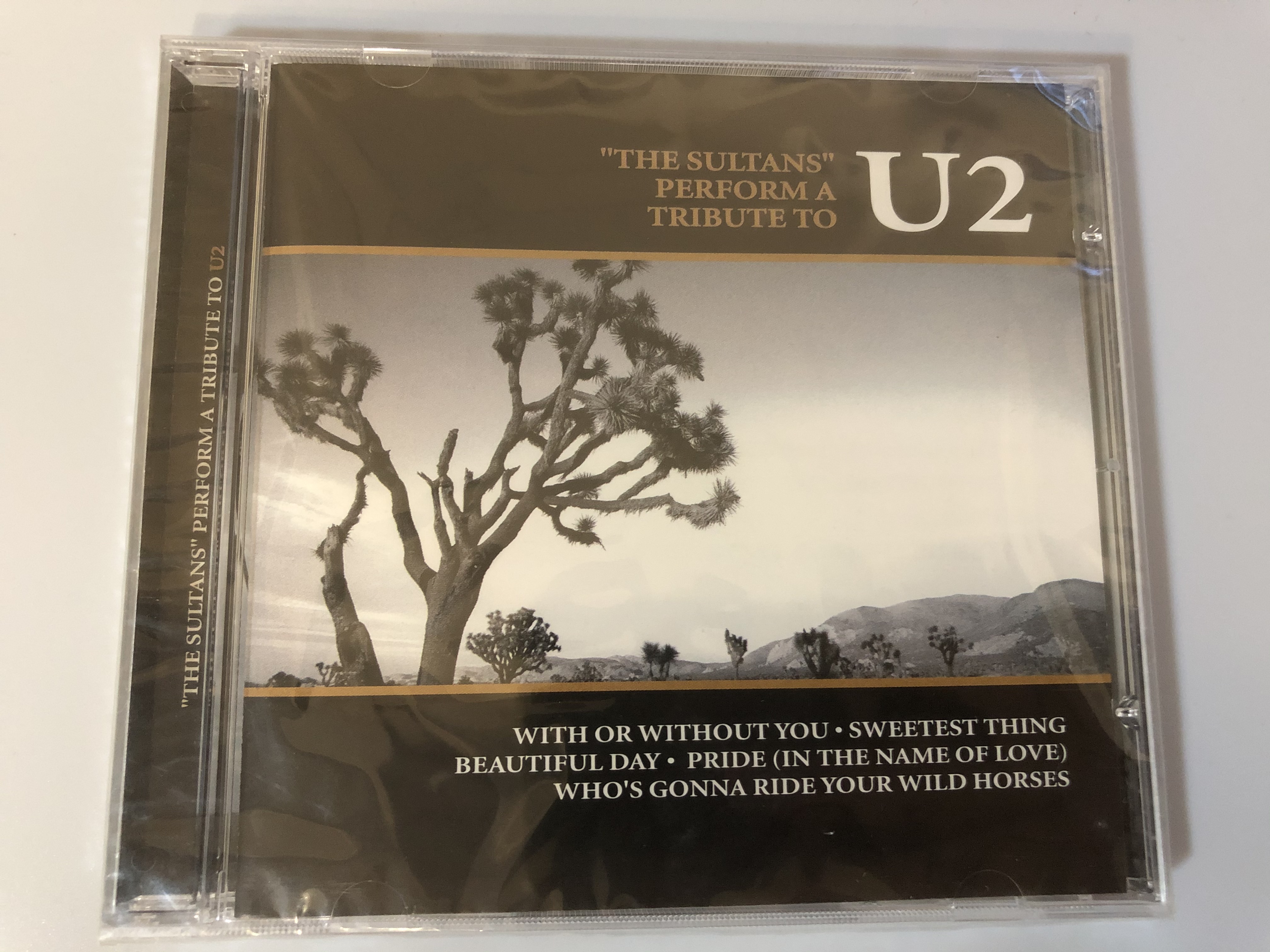 -the-sultans-perform-a-tribute-to-u2-with-or-without-you-sweetest-thing-beautiful-day-pride-in-the-name-of-love-who-s-gonna-ride-your-wild-horses-time-international-limited-audio-cd-1-.jpg