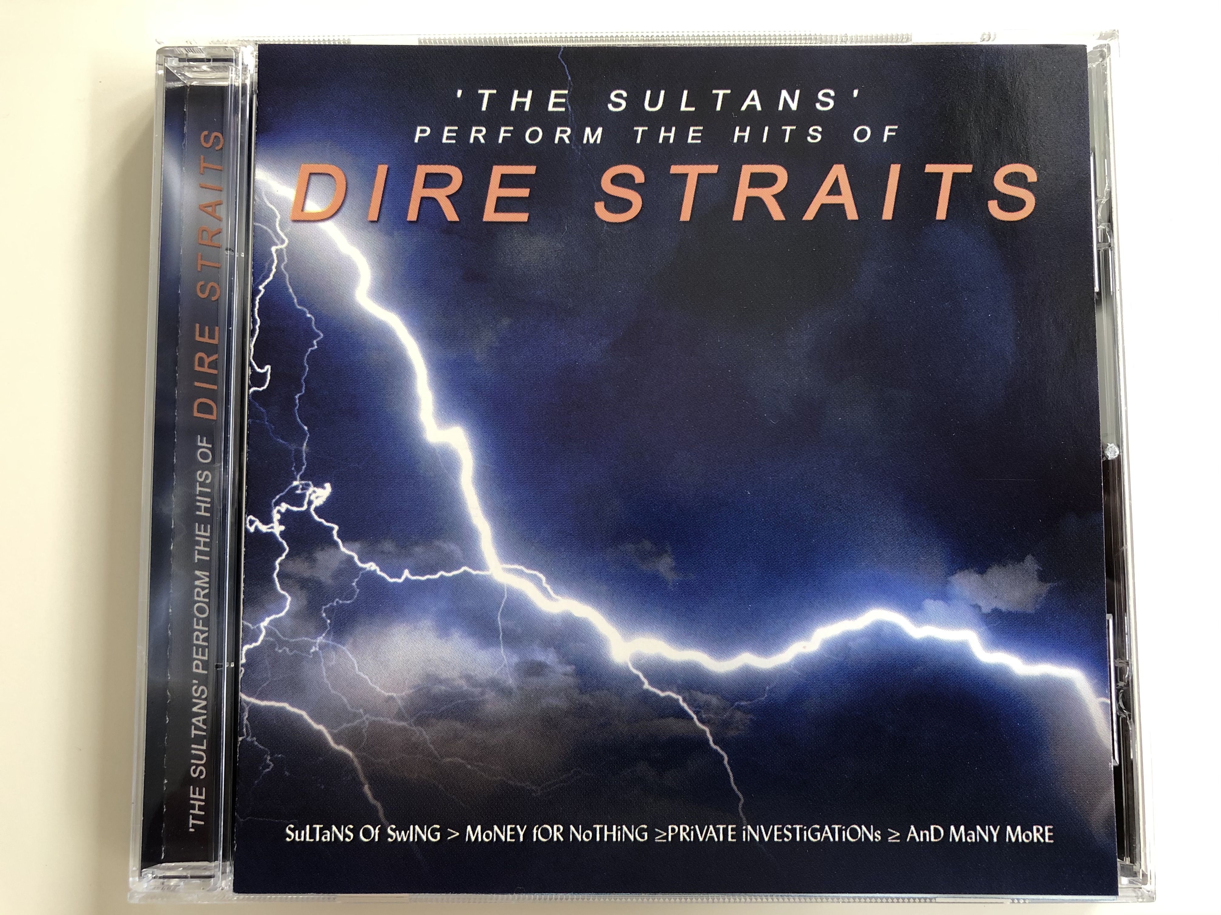 -the-sultans-perform-the-hits-of-dire-straits-sultans-of-swing-money-for-nothing-private-investigations-and-many-more-time-music-international-ltd.-audio-cd-2001-tmi192-1-.jpg