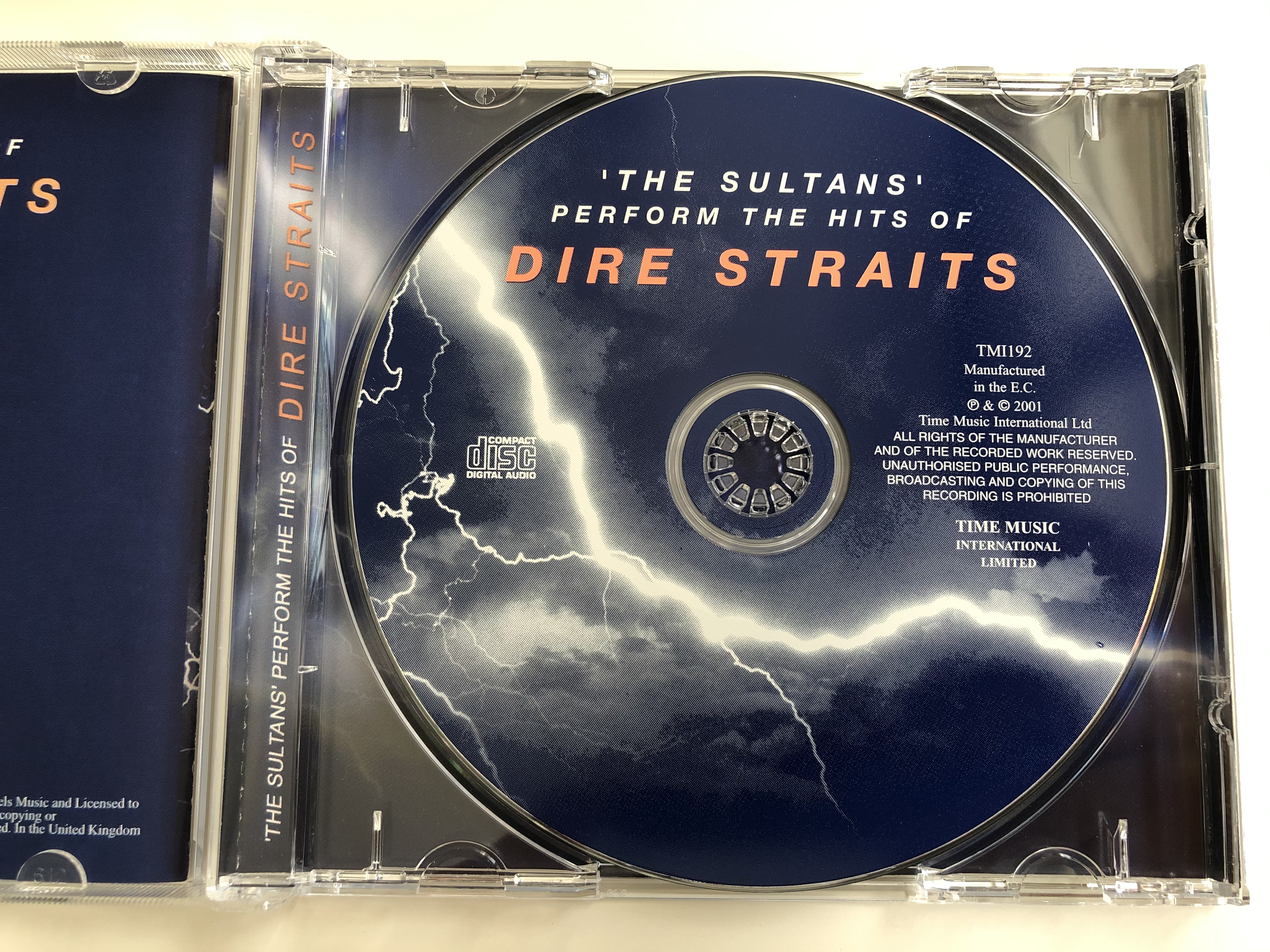 -the-sultans-perform-the-hits-of-dire-straits-sultans-of-swing-money-for-nothing-private-investigations-and-many-more-time-music-international-ltd.-audio-cd-2001-tmi192-4-.jpg