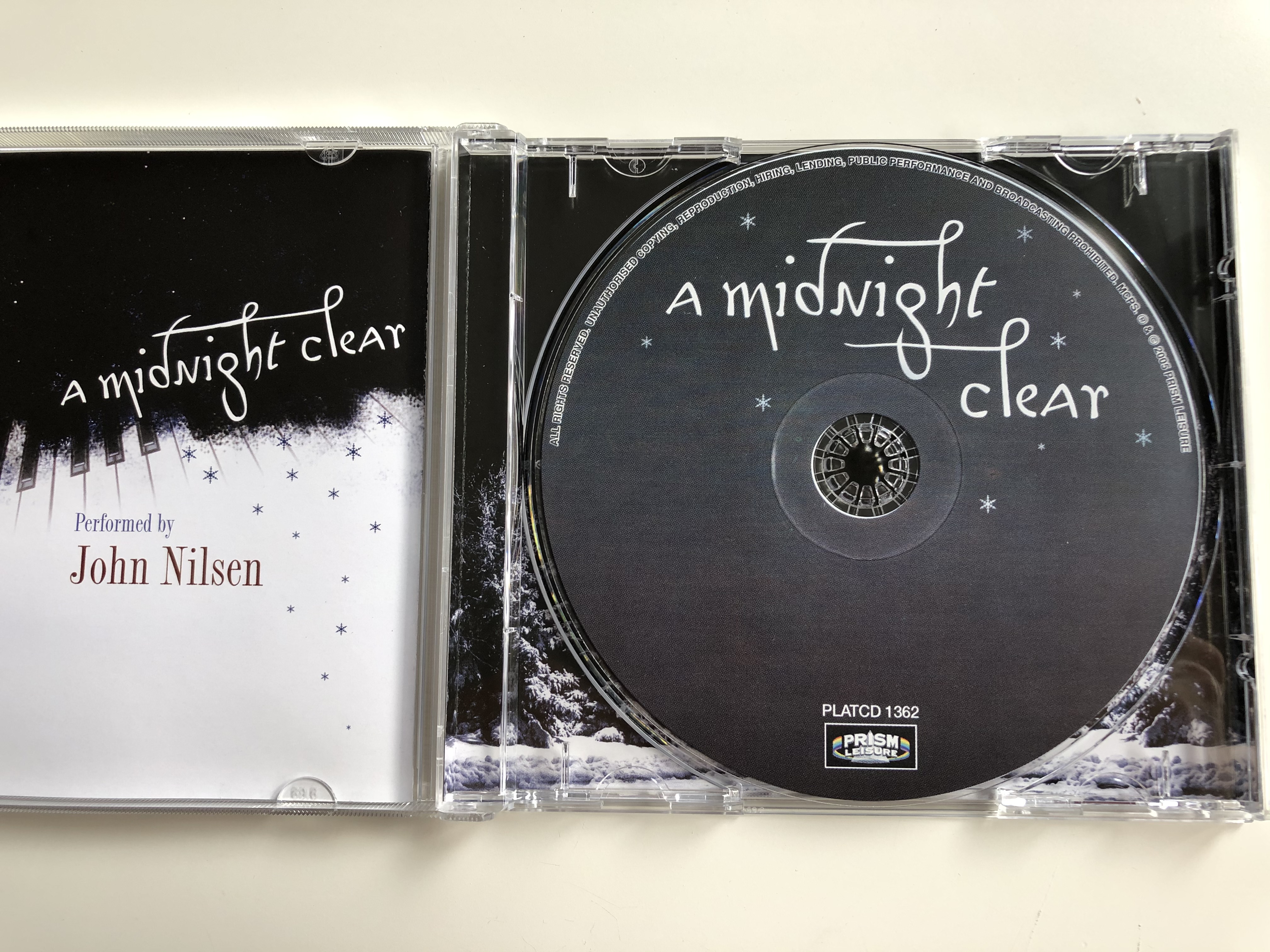 a-midnight-clear-enchanting-traditional-christmas-songs-on-piano-performed-by-john-nilsen-prism-leisure-audio-cd-2005-platcd-1362-3-.jpg