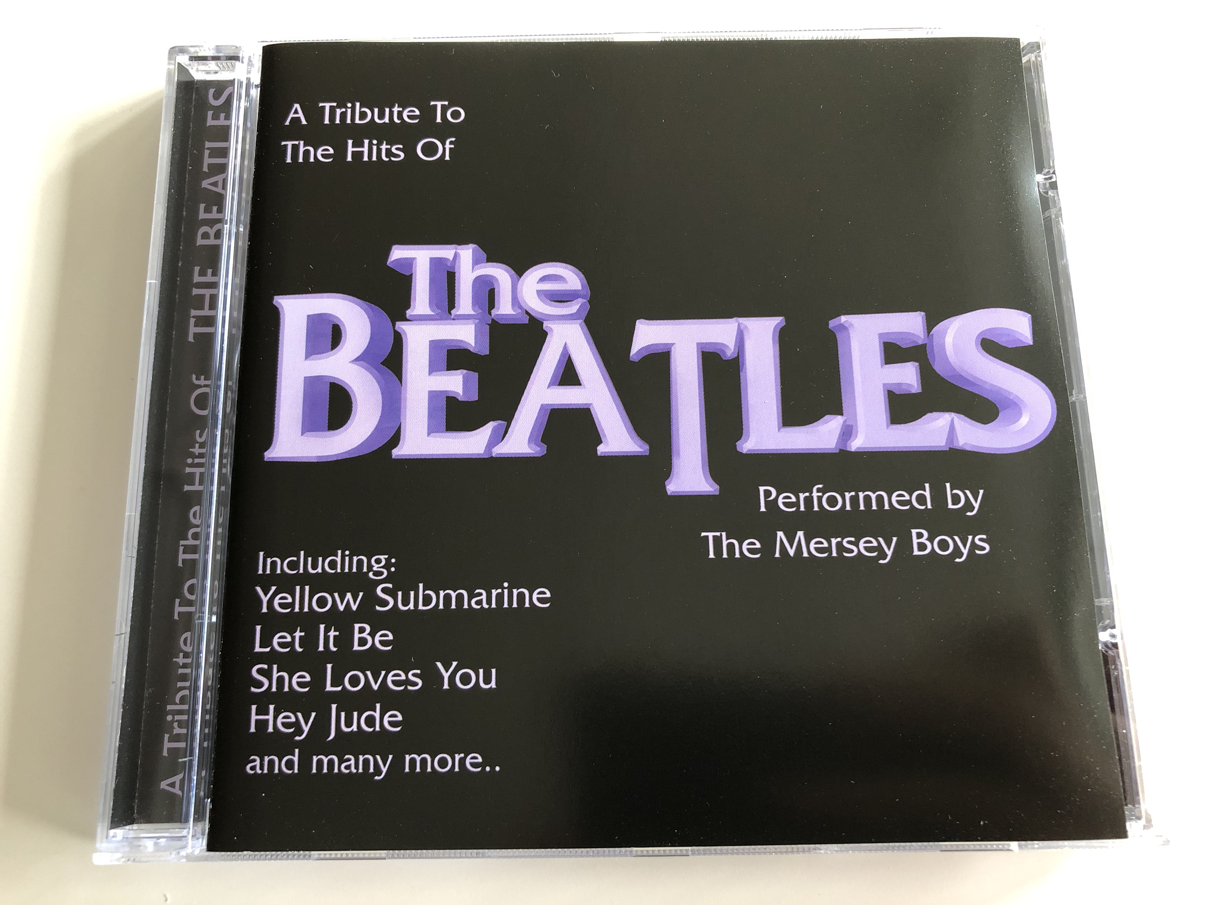 a-tribute-to-the-hits-of-beatles-performed-by-the-mersey-boys-including-yellow-submarine-let-it-be-she-loves-you-hey-jude-and-many-more...-sp-series-audio-cd-2004-sp113-2-1-.jpg