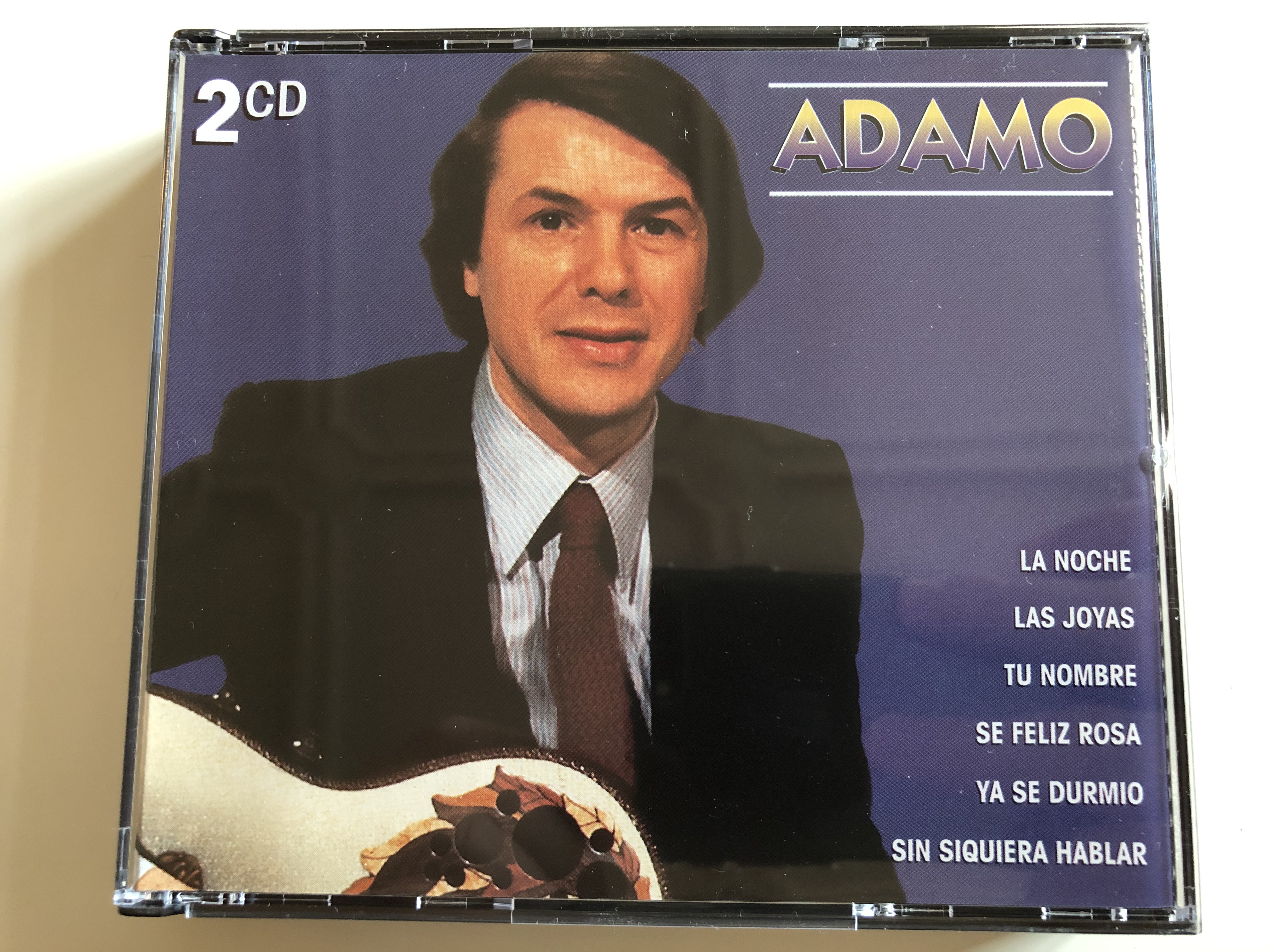 adamo-la-noche-las-joyas-tu-nombre-se-feliz-rosa-ya-se-durmio-sin-siquiera-hablar-biemstemra-2x-audio-cd-1997-kbox-269-1-.jpg