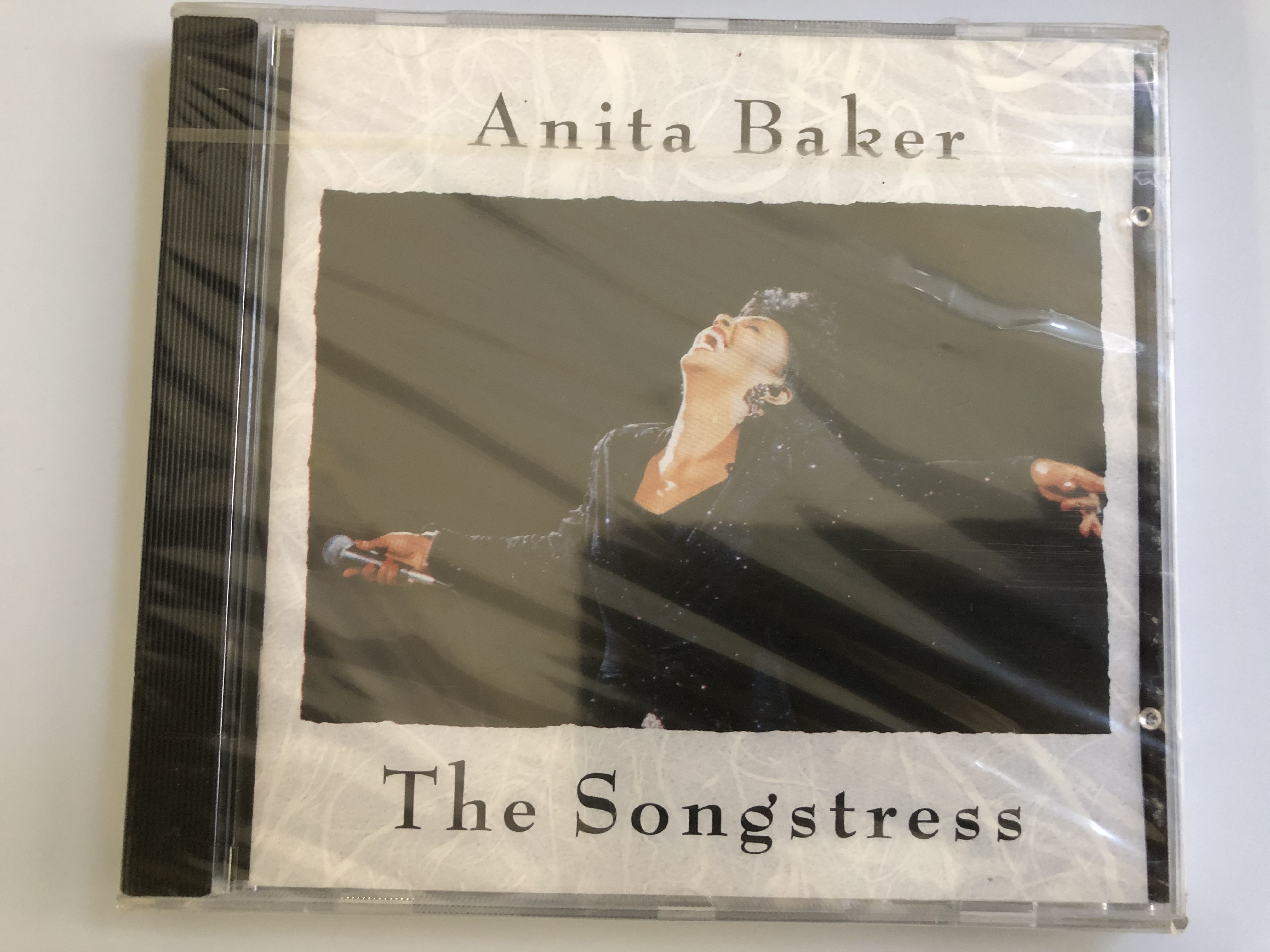 anita-baker-the-songstress-elektra-audio-cd-1991-7559-61116-2-1-.jpg