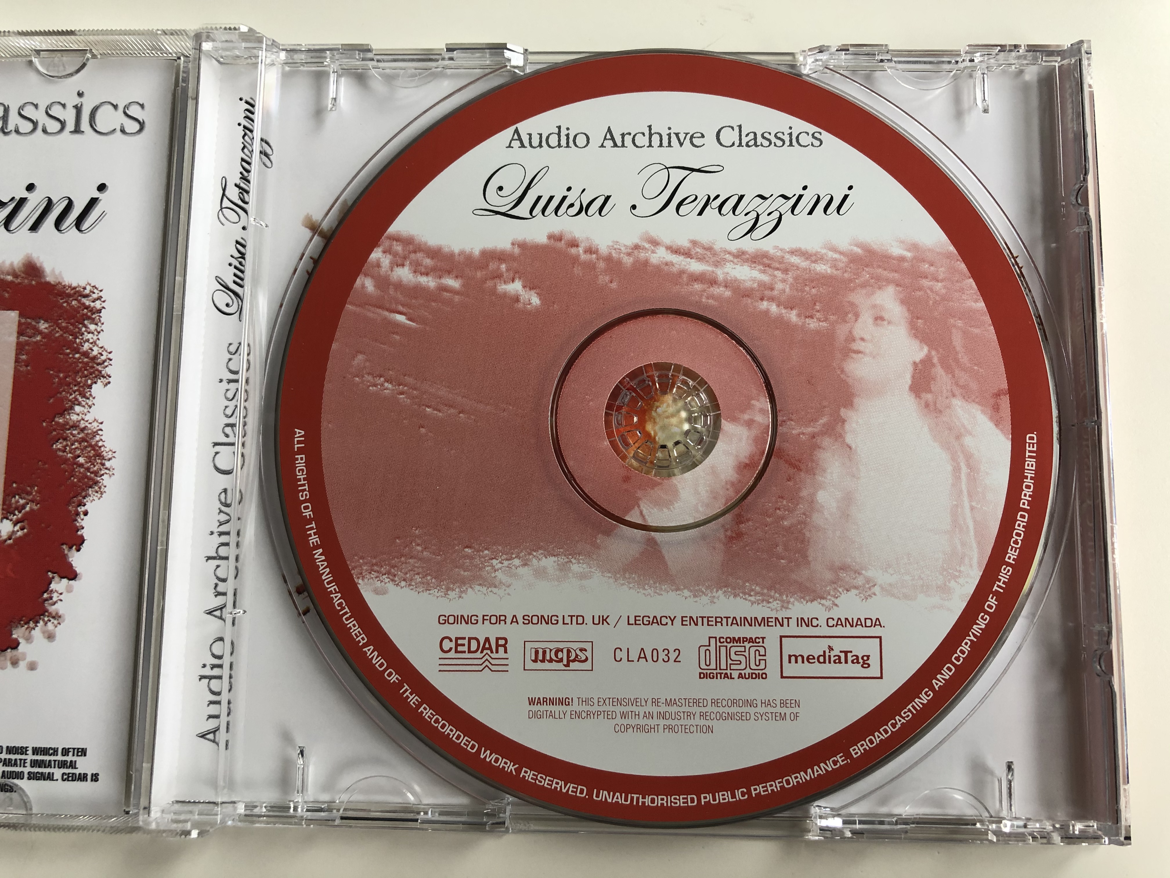 audio-archive-classics-luisa-tetrazzini-including-moments-from-verdi-la-traviata-delibes-lakme-bellini-i-puritani-and-many-more-audio-archive-classics-audio-cd-cla032-3-.jpg