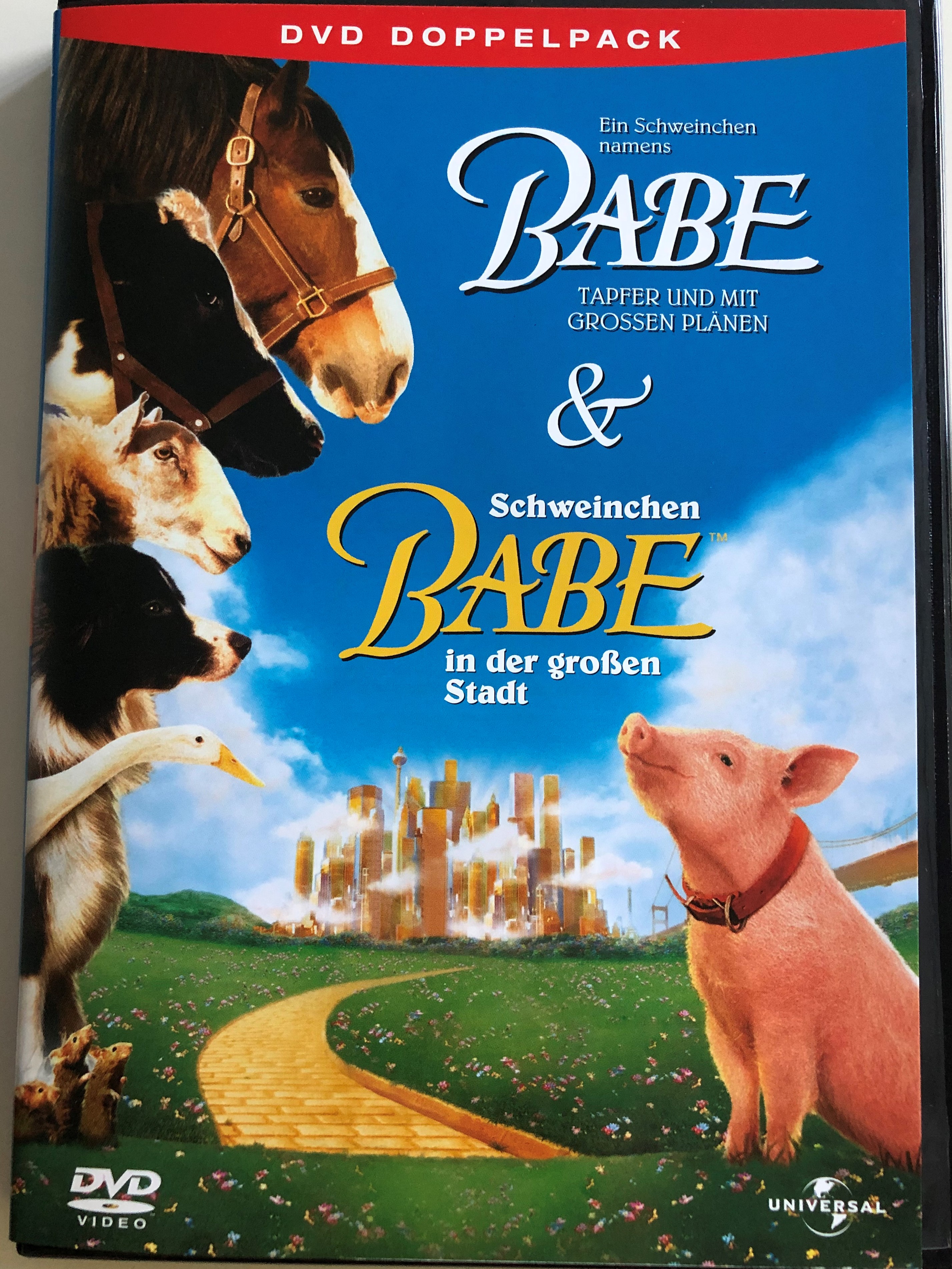 babe-babe-pig-in-the-city-dvd-double-pack-2004-ein-schweinchen-namens-babe-schweinchen-babe-in-der-gro-en-stadt-dvd-doppelpack-directed-by-chris-noonan-starring-james-cromwell-magda-szubanski-1-.jpg