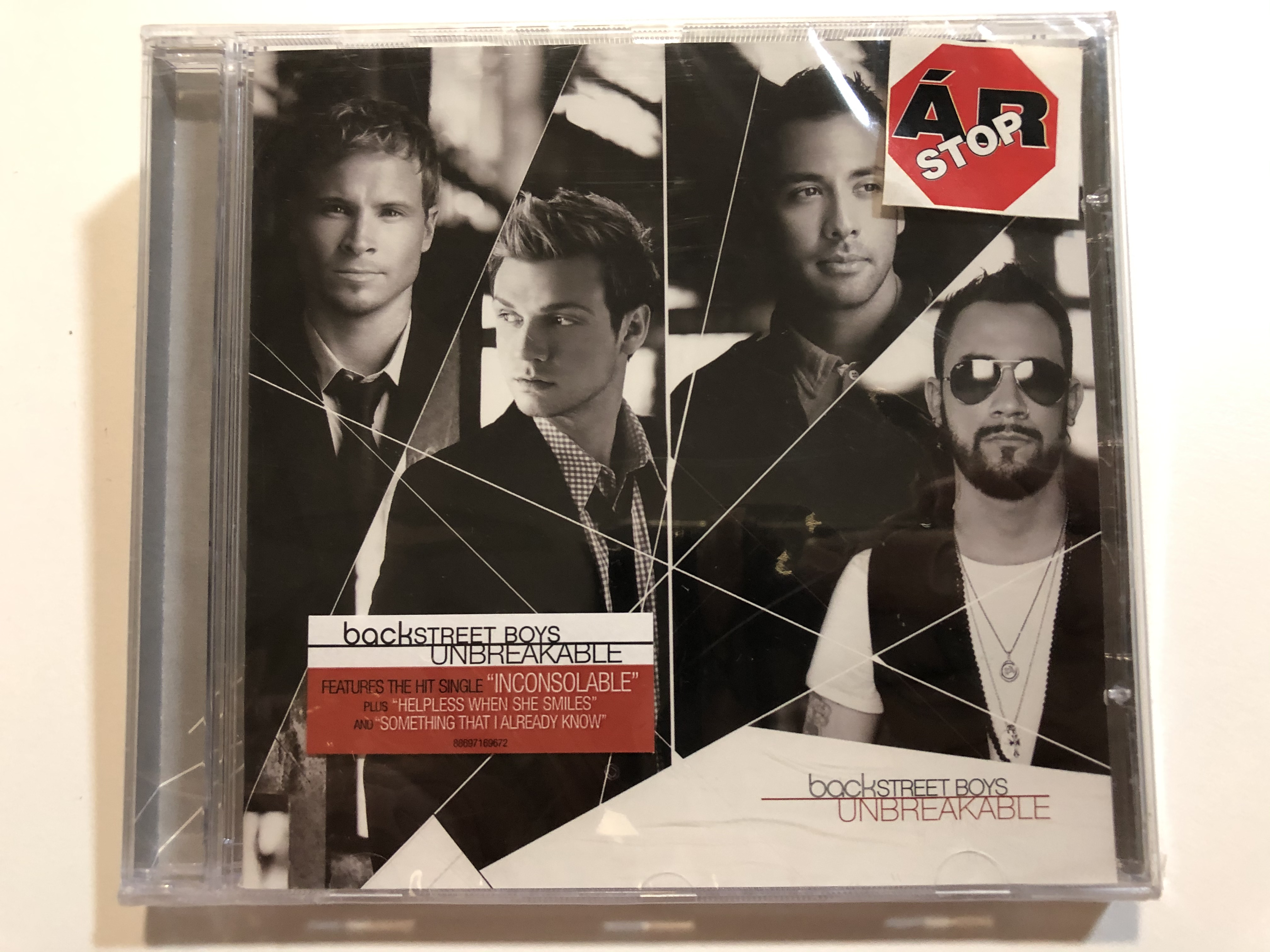 backstreet-boys-unbreakable-features-the-hit-single-inconsolable-plus-helpless-when-she-smiles-and-something-that-i-already-know-jive-audio-cd-2007-88697-16967-2-1-.jpg