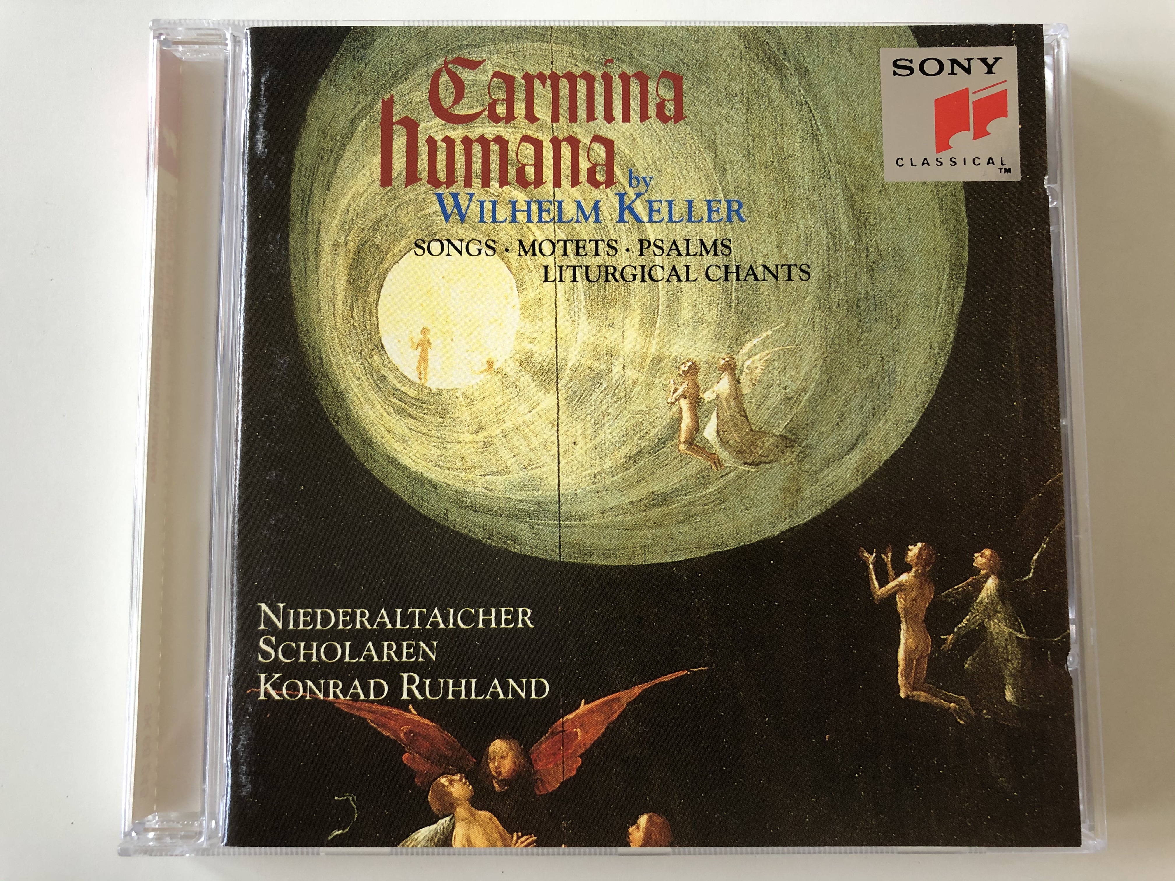 carmina-humana-by-wilhelm-keller-songs-motets-psalms-liturgical-chants-niederaltaicher-scholaren-konrad-ruhland-sony-classical-audio-cd-1995-sk-68245-1-.jpg