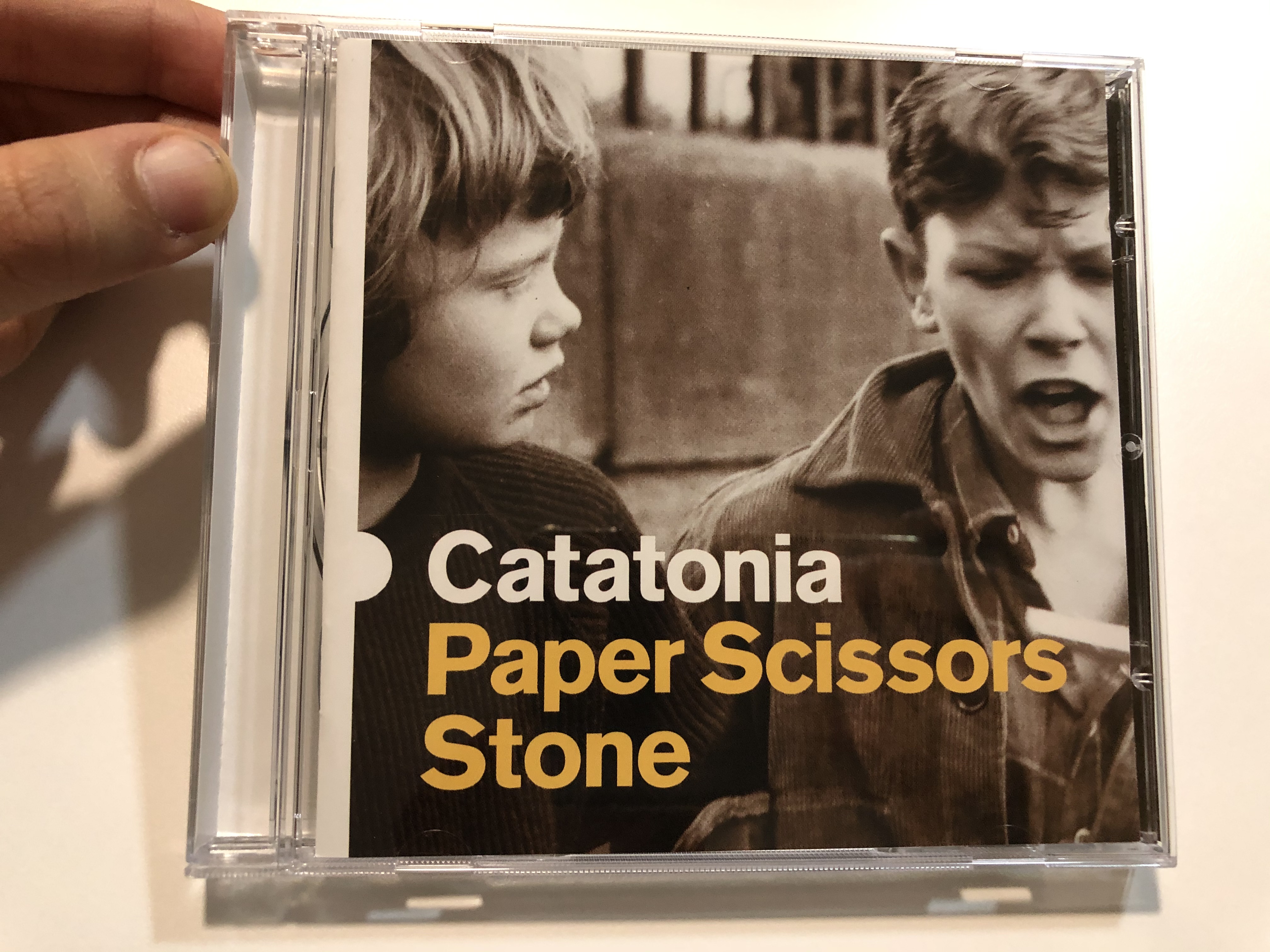 catatonia-paper-scissors-stone-blanco-y-negro-audio-cd-2001-8573-88848-2-1-.jpg