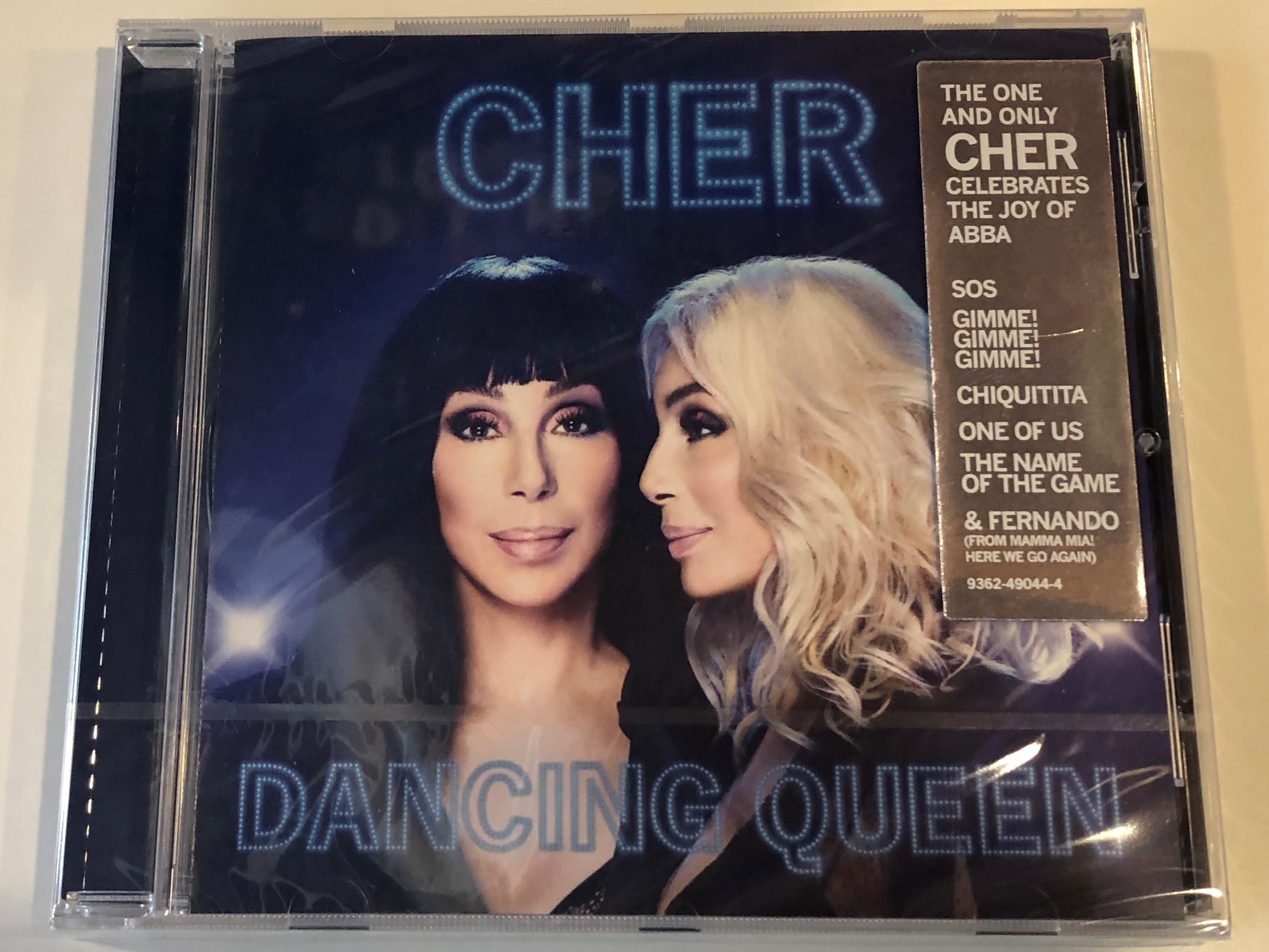 cher-dancing-queen-sos-gimme-gimme-gimme-chiquitita-one-of-us-the-name-of-the-game-fernando-from-mamma-mia-here-we-go-again-warner-bros.-records-audio-cd-2018-9362-49044-4-1-.jpg