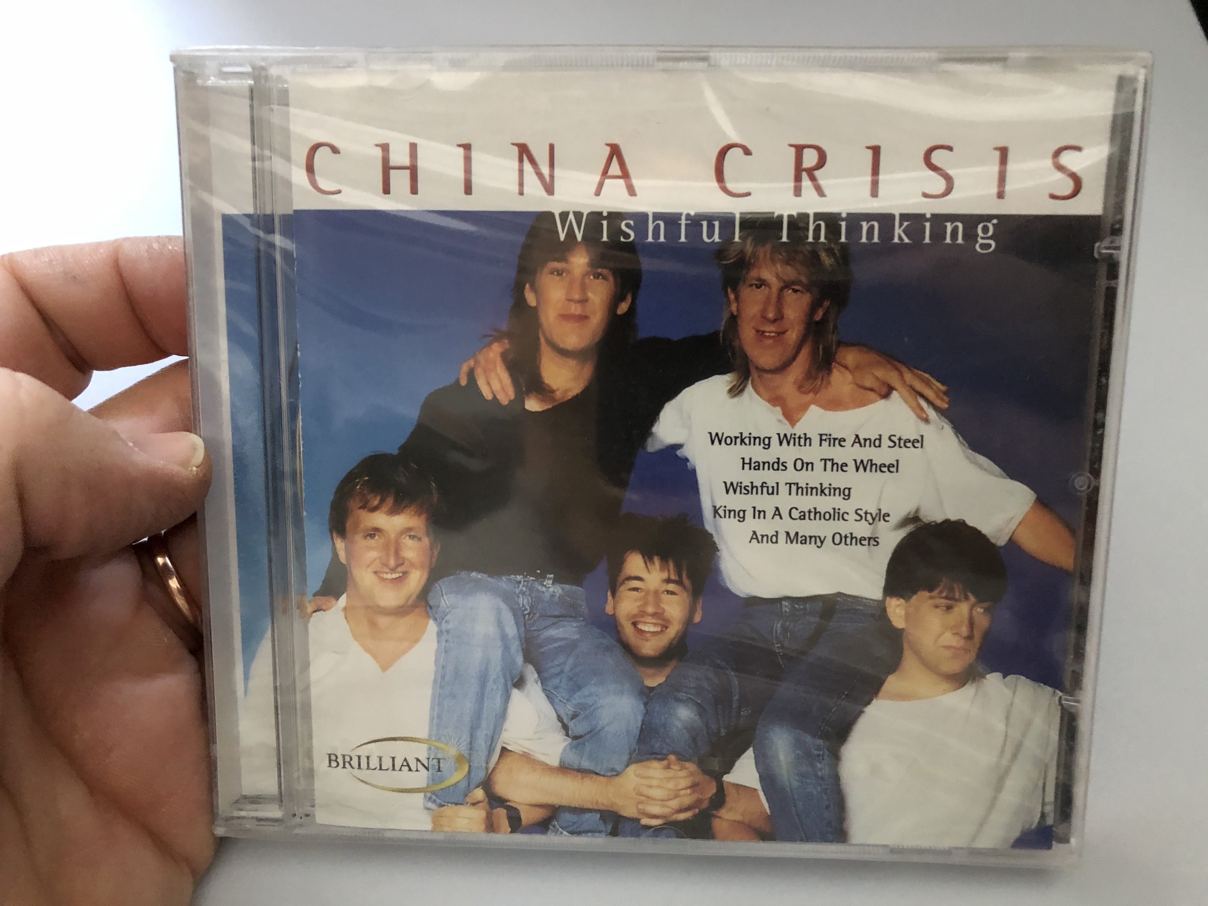 china-crisis-wishful-thinking-working-with-fire-and-steel-hands-on-the-wheel-whishful-thinking-king-in-a-catholic-style-and-many-others-brilliant-audio-cd-1999-bt-33043-1-.jpg