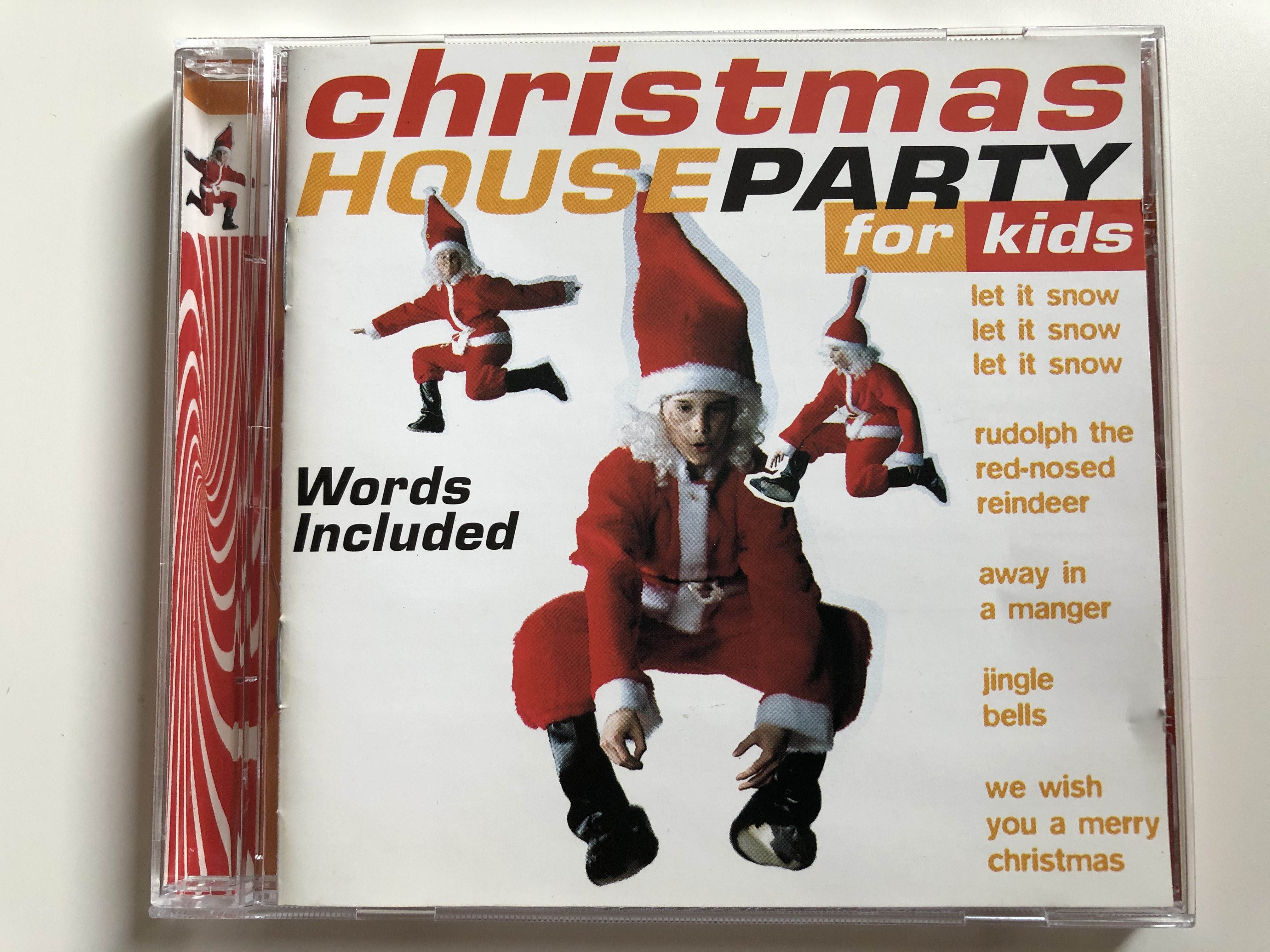 christmas-houseparty-for-kids-words-included-let-it-snow-let-it-snow-rudolph-the-red-nosed-reindeer-away-in-a-manger-jingle-bells-we-wish-you-a-merry-christmas-disky-audio-cd-1997-ki-1-.jpg