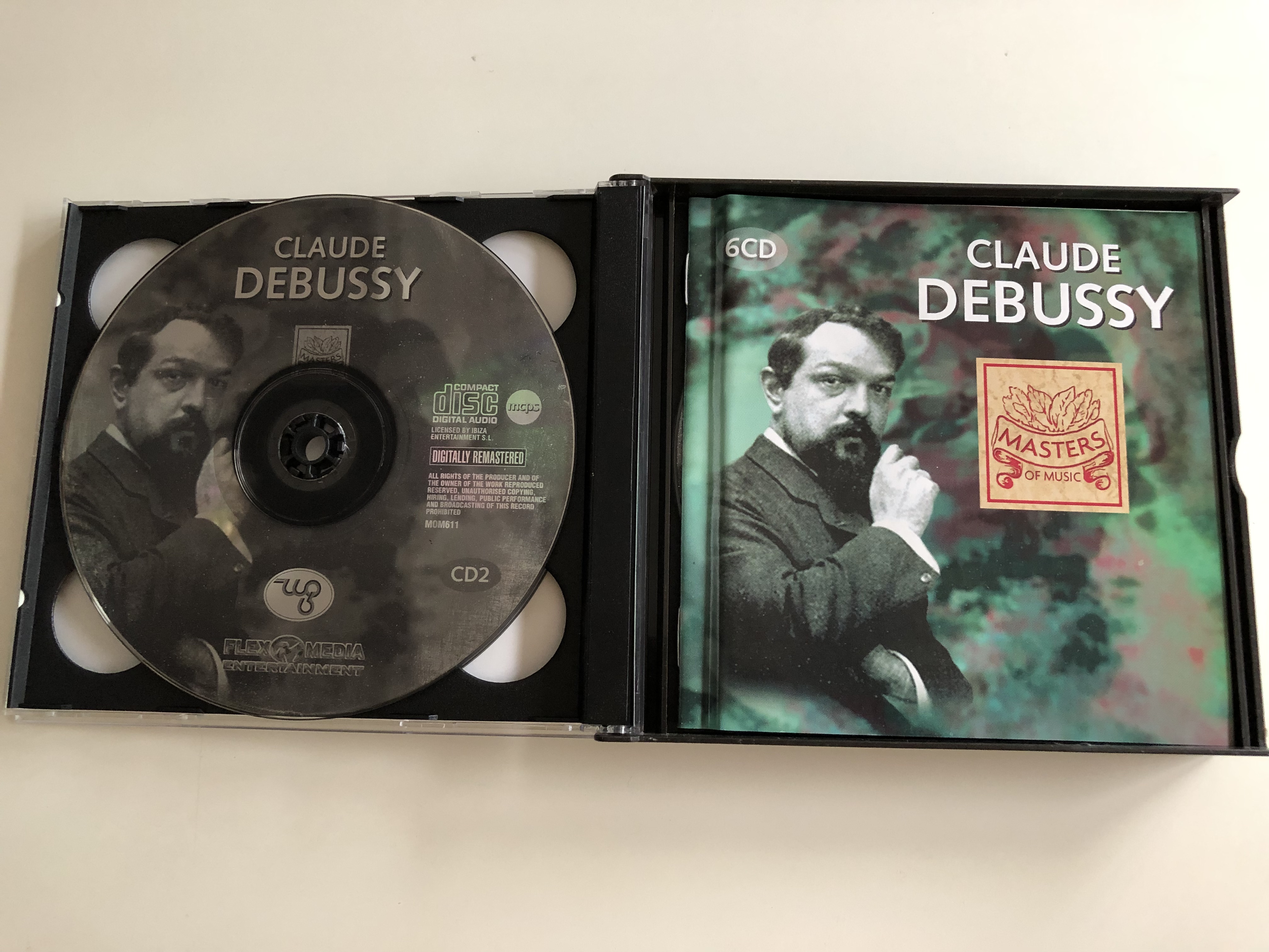 claude-debussy-doctor-gradus-ad-parnassum-jimbo-s-lullaby-serenade-for-the-doll-the-snow-is-dancing-the-little-shepherd-gollwogg-s-cake-walk-6-cd-masters-of-music-mom-611-4-.jpg
