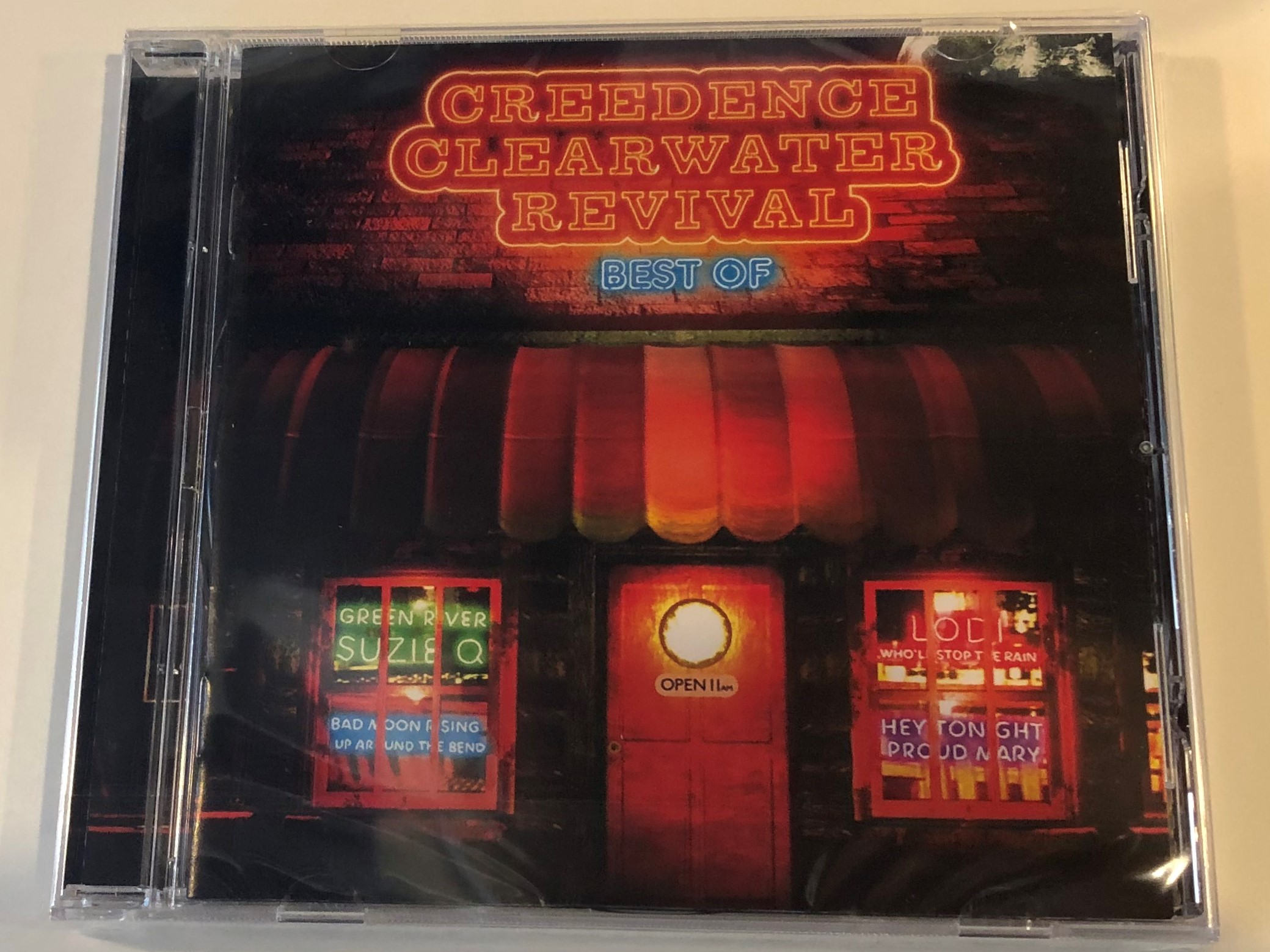 creedence-clearwater-revival-best-of-green-river-susie-q-bad-moon-rising-up-around-the-bend-lodi-who-ll-stop-the-rain-hey-tonight-proud-mary-fantasy-audio-cd-2008-fan-30870-02-1-.jpg