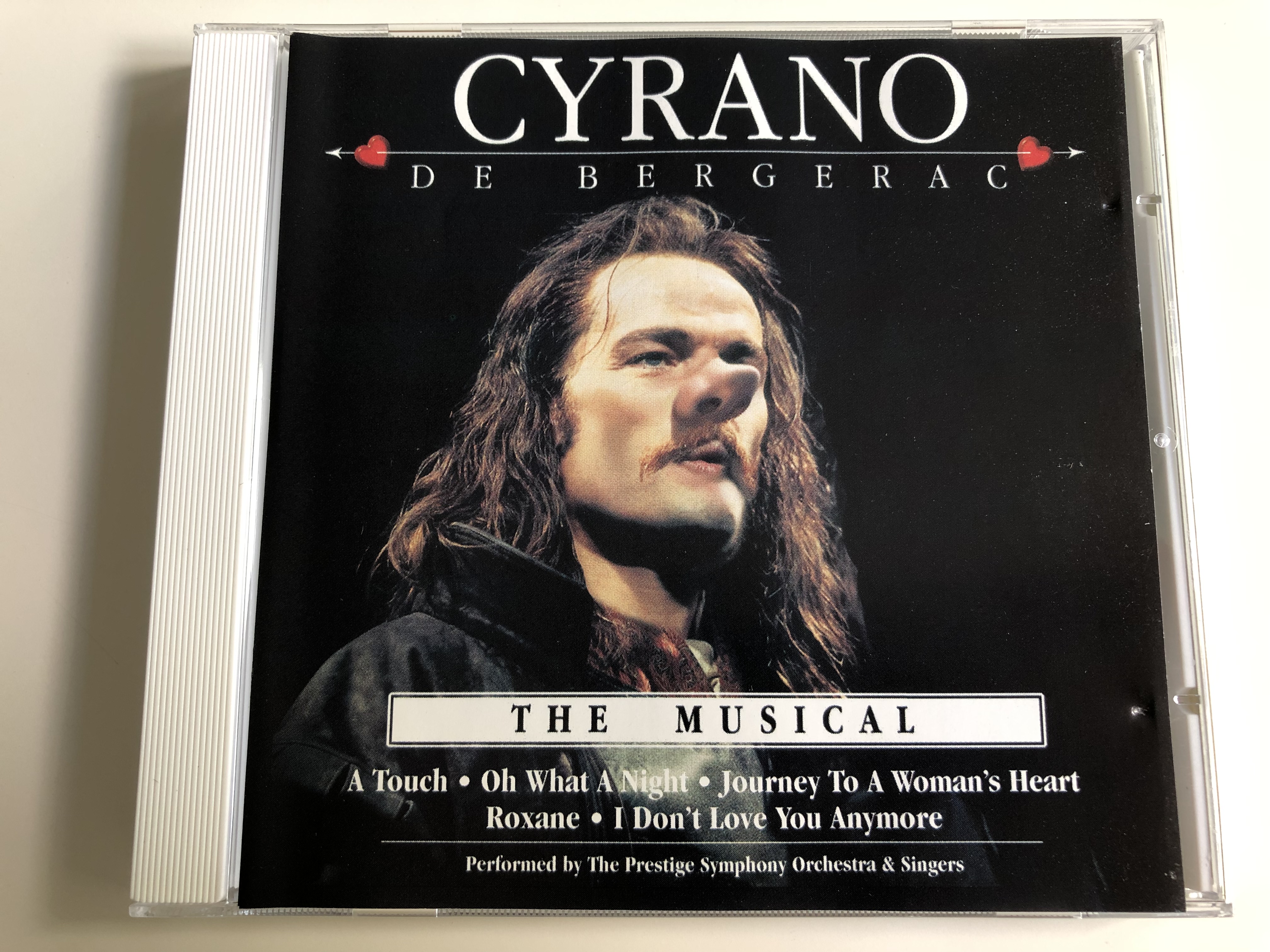 cyrano-de-bergerac-the-musical-a-touch-oh-what-a-night-journey-to-a-woman-s-heart-performed-by-the-prestige-symphony-orchestra-singers-audio-cd-2007-fg468-1-.jpg