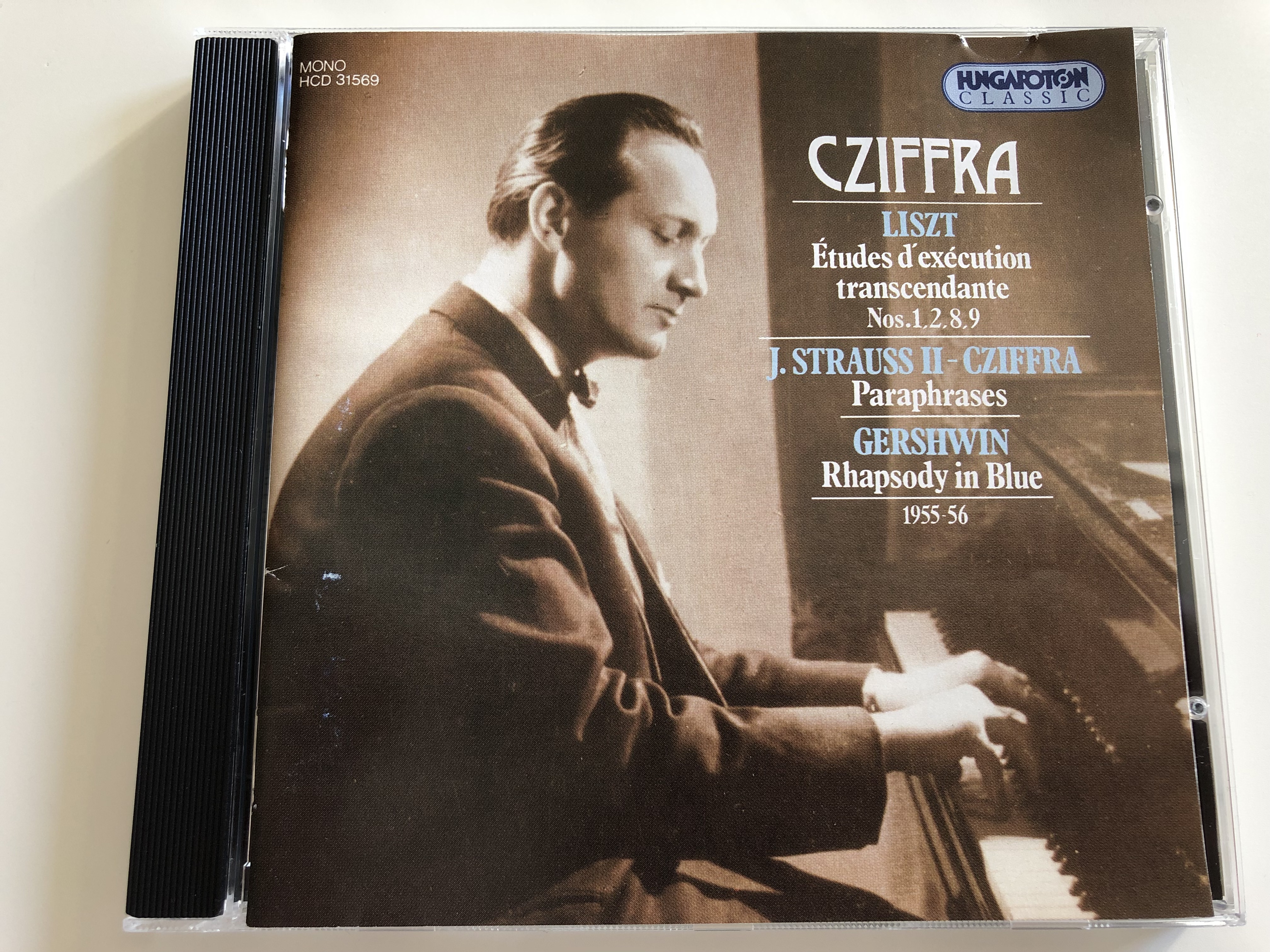 cziffra-liszt-etudes-d-execution-transcendante-nos.-1-2-8-9-j.-strauss-ii-cziffra-paraphrases-gershwin-rhapsody-in-blue-1955-56-hungaroton-classic-audio-cd-1994-mono-hcd-31569-1-.jpg