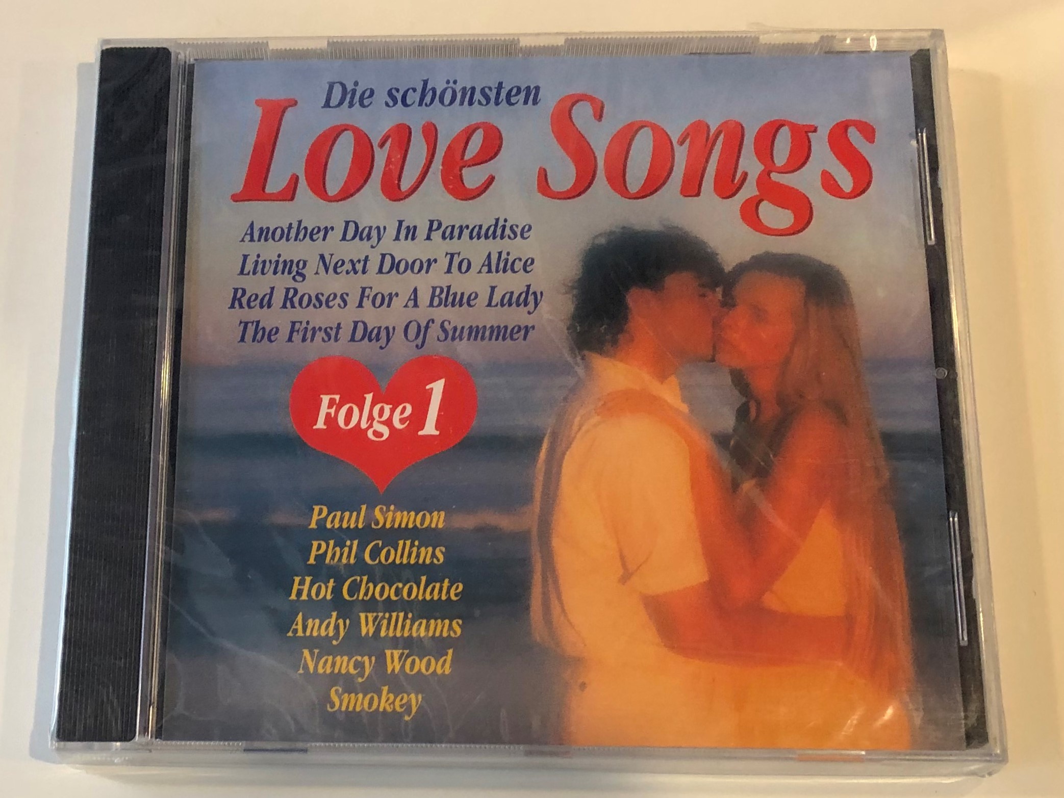 die-sch-nsten-love-songs-folge-1-another-day-in-paradise-living-next-door-to-alice-red-roses-for-a-blue-lady-the-first-day-of-summer-paul-simon-phil-collins-hot-chocolate-andy-williams-1-.jpg