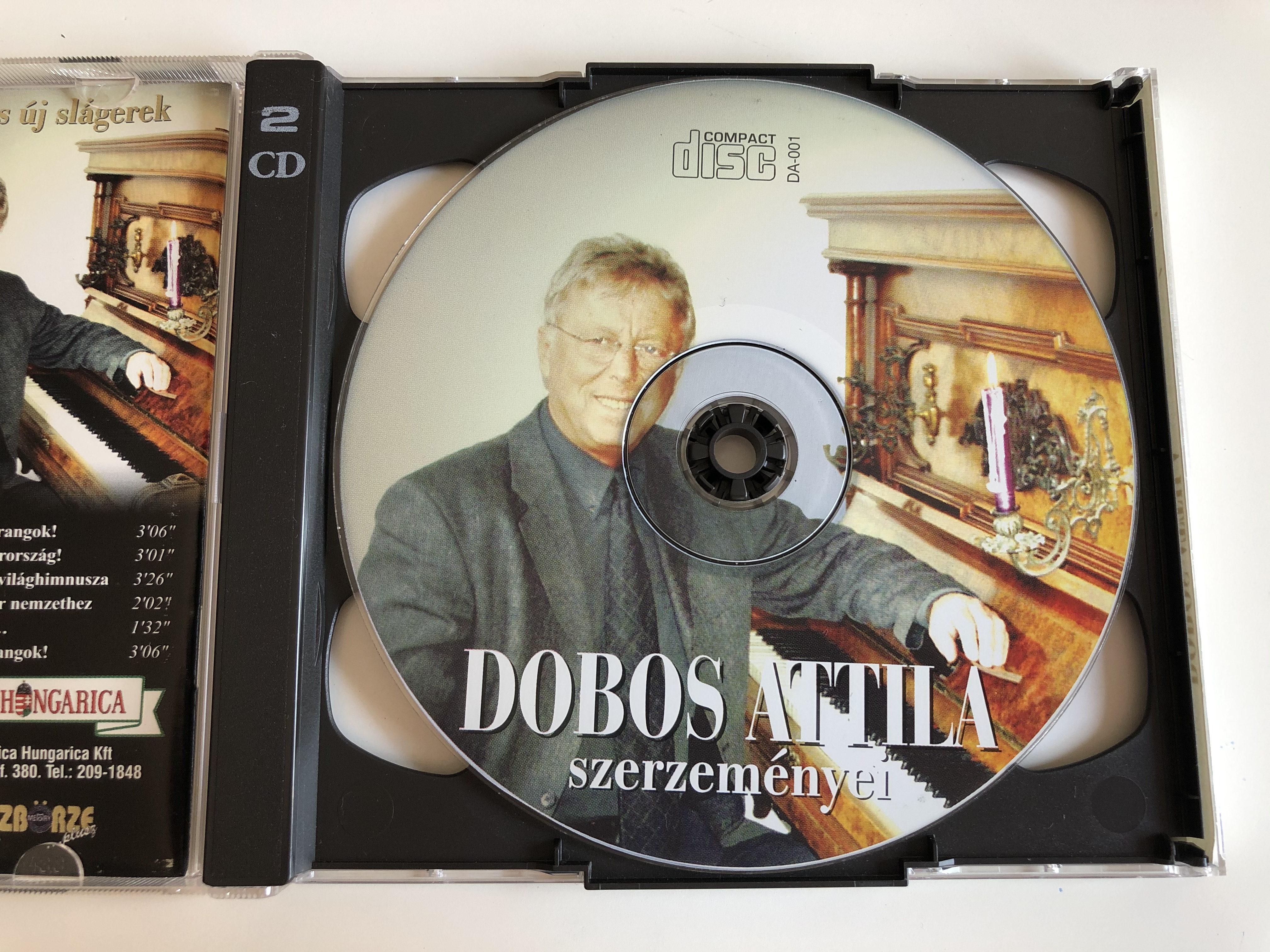 dobos-attila-szerzem-nyei-mary-zsuzsi-dobos-angie-hoffer-gyorgy-peller-anna-regi-es-uj-slagerek-musica-hungarica-ltd.-2x-audio-cd-2001-5999880437011-11-.jpg